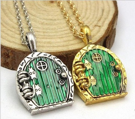 „Hobbit“ durų poros medalionai iš aukso ir sidabro