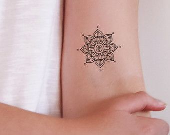 mažas mandalos tatuiruotės dizainas