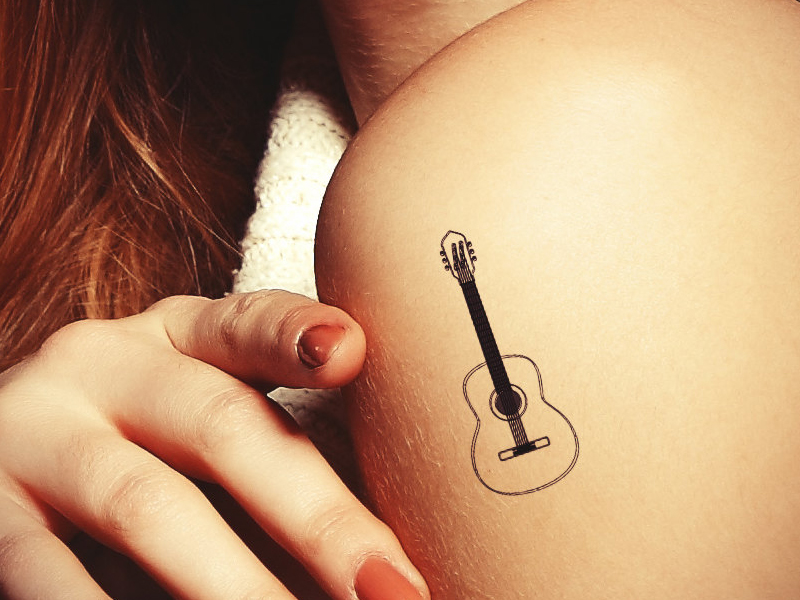 Gitaros tatuiruotės dizainas su reikšmėmis