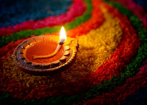 Rangoli dizainas su Diya