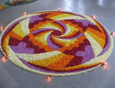 Įvairūs gėlių žiedlapiai ir Diyas Rangoli
