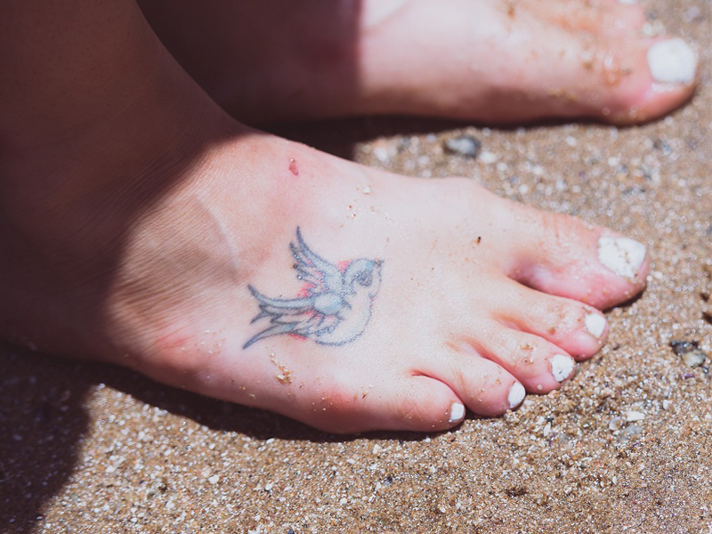 Pėdų tatuiruotės dizainas