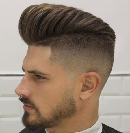 Pompadour išsiskyrė su odos išblukimu