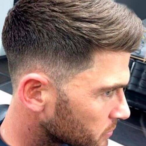 Stulbinantis „Mid Fade“ kirpimas