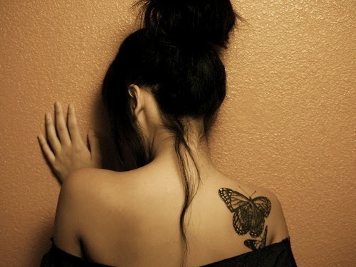 Drugelio tatuiruotė ant moterų