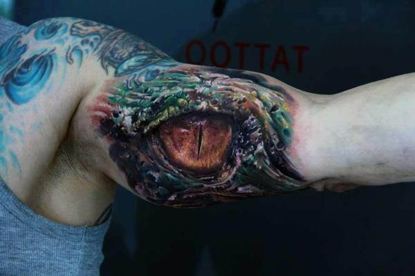 Τρισδιάστατα τατουάζ άνω βραχίονα μάτι δράκος