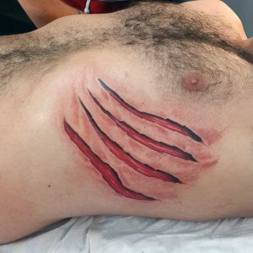 Įspūdingas suplėšytos odos tatuiruotės dizainas