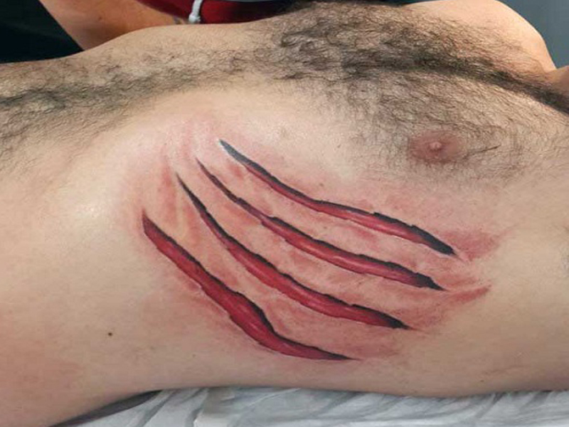 Suplėšytos odos tatuiruotės idėjos, dizainas ir vaizdai
