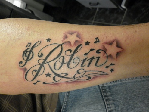 Žvaigždės vardo tatuiruotė