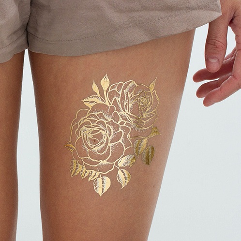 Nuimama auksinė tatuiruotė