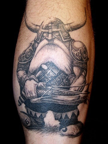 Fantazijos nykštukų tatuiruotė