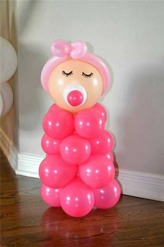 Διακόσμηση ντους μωρού από μπαλόνια σε ροζ φιγούρα μωρού