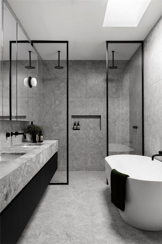 Σχέδια μπάνιου σε γκρι, κυρίαρχο χρώμα γκρι, μικρές πινελιές σε μαύρο, μπανιέρα ελεύθερης τοποθέτησης, λευκό