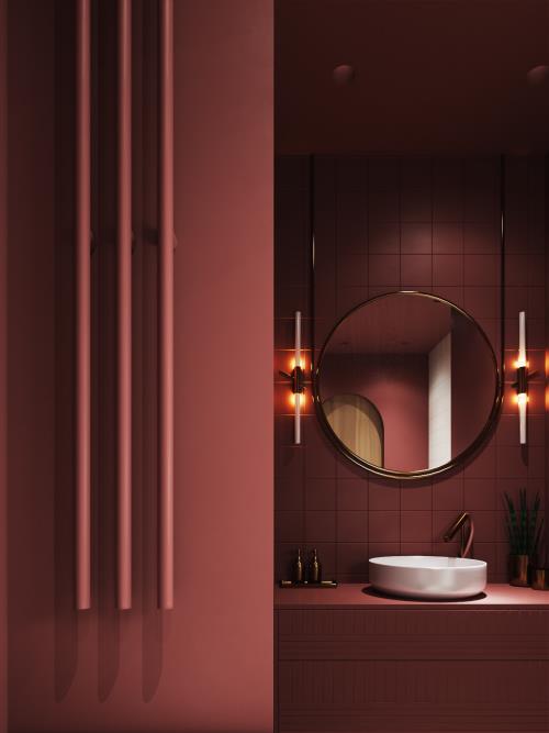Μπάνιο σε κόκκινο όμορφο, κομψά σχεδιασμένο μπάνιο σε απαλή απόχρωση κόκκινου, στρογγυλού καθρέφτη, φωτιστικά τοίχου, στρογγυλό λευκό νιπτήρα