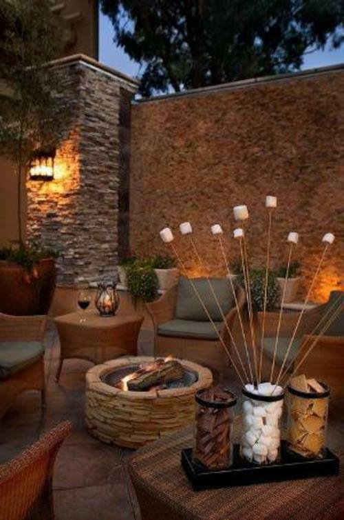 Μπαλκόνι με κεριά αρώματος κήπου με σχεδιασμό φυσικής πέτρας