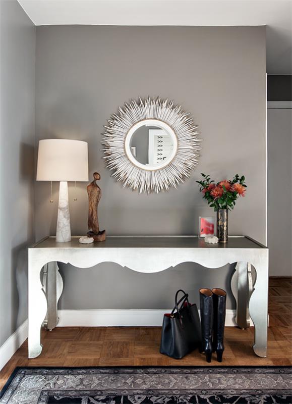 Διακοσμητικός καθρέφτης τοίχου στο διάδρομο μοντέρνος σχεδιασμός στρογγυλός καθρέφτης λευκό τραπέζι
