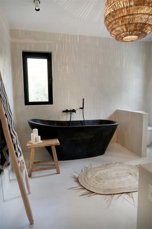 Το χρώμα συνδυάζει το τέλειο μπάνιο με μαύρους και κρεμ μαύρους τοίχους με κρεμ χρώμα μπανιέρας και ξύλο με άλλα φυσικά υλικά