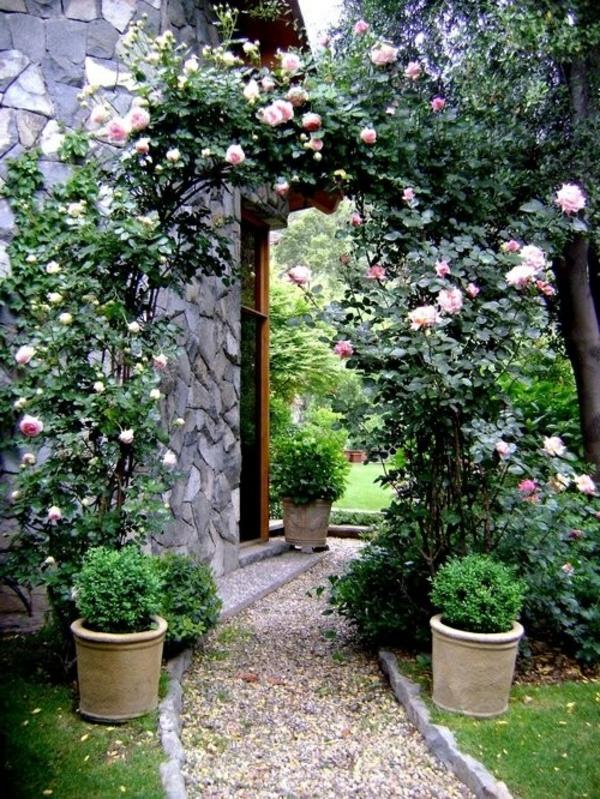 Σχεδιασμός κήπου χαλίκια πέτρες τριαντάφυλλα καλλιεργητές μονοπάτι