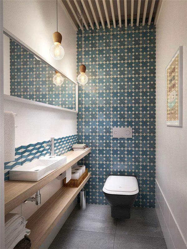 Οι τουαλέτες επισκεπτών έχουν σχεδιαστεί με απλά ξύλινα πλακάκια ραφιών
