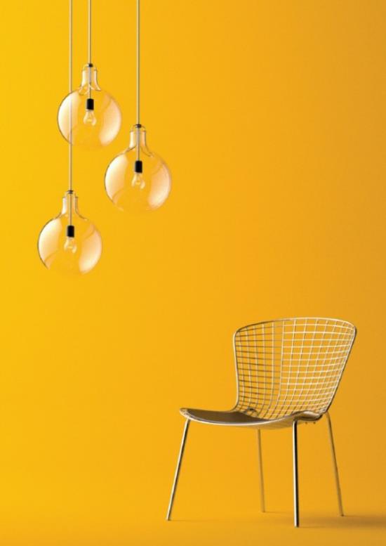 Κρεμαστά φώτα τριών απλών σχεδίων κίτρινη καρέκλα φόντου