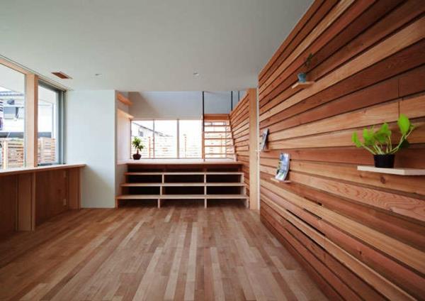 Ξύλινα μπανγκαλόου από ξύλο και ξύλινα σπίτια μέσα σε προκατασκευασμένο σπίτι