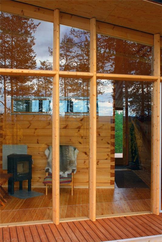 Luxury Villa Valtanen ξύλινη πρόσοψη ξύλινο δάπεδο με δοκάρια παράθυρο