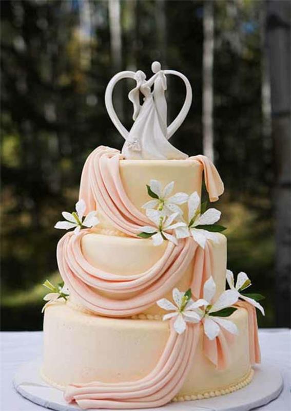 Γαμήλιες τούρτες κέικ πολλαπλών επιπέδων χρώμα ροδάκινο νύφη