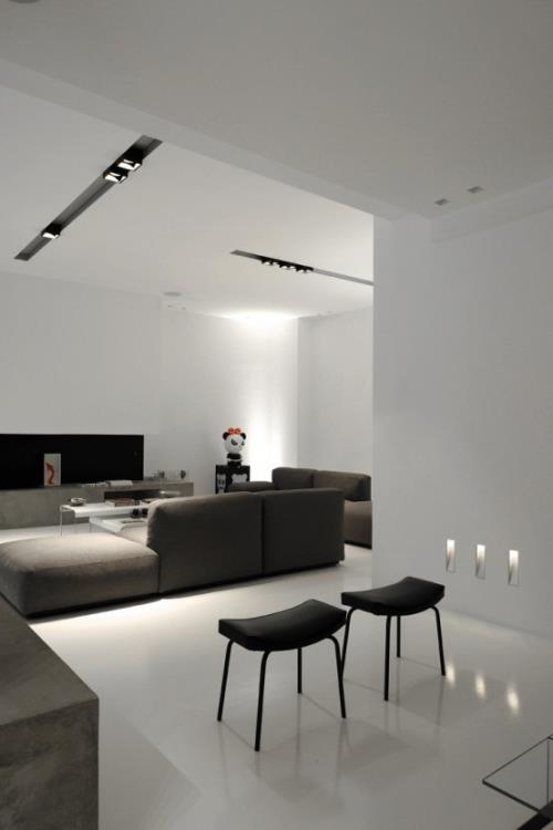 Μινιμαλισμός στο σαλόνι τέλεια σχεδίαση δωματίου ενσωματωμένα φώτα τυπικός φωτισμός δωματίου