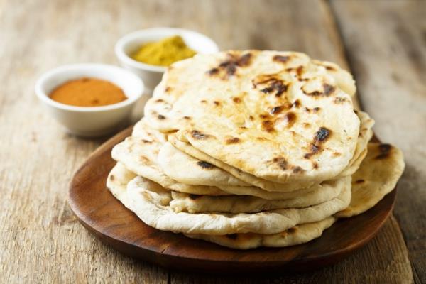 Breadωμί Naan που ψήνει ασιατικούς τύπους ψωμιού