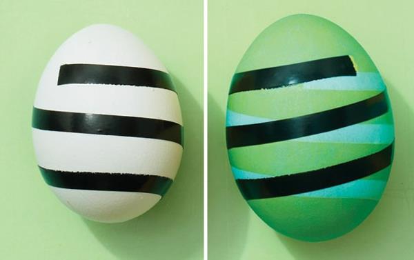Τα πασχαλινά αυγά βάφουν πολύχρωμα μαύρα λεπτά λουλούδια
