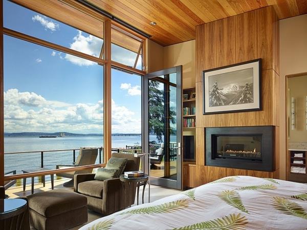 Όμορφο σπίτι δίπλα στη λίμνη υπνοδωμάτιο με θέα στον ωκεανό πολυθρόνα ανάγνωσης