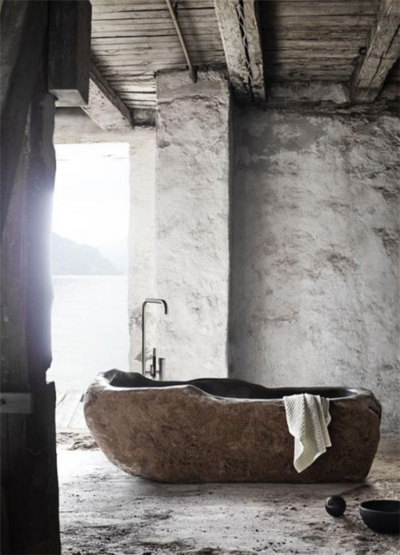 Πέτρα στην μπανιέρα μπάνιου από πέτρα οργανικής μορφής φυσική υφή