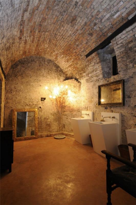 Πέτρα στο μπάνιο όλοι οι πέτρινοι τοίχοι έχουν καλή αίσθηση φωτισμού σαν να βρίσκεστε σε μια σπηλιά με πολυτελείς πινελιές