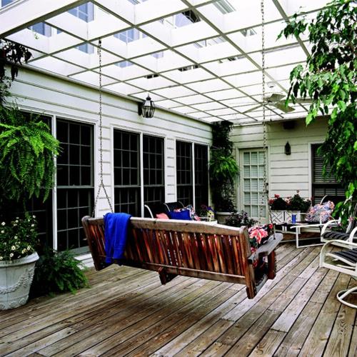 Η βεράντα ή το μπαλκόνι σας ηλιόλουστη βεράντα χειμερινό γυαλί κήπου