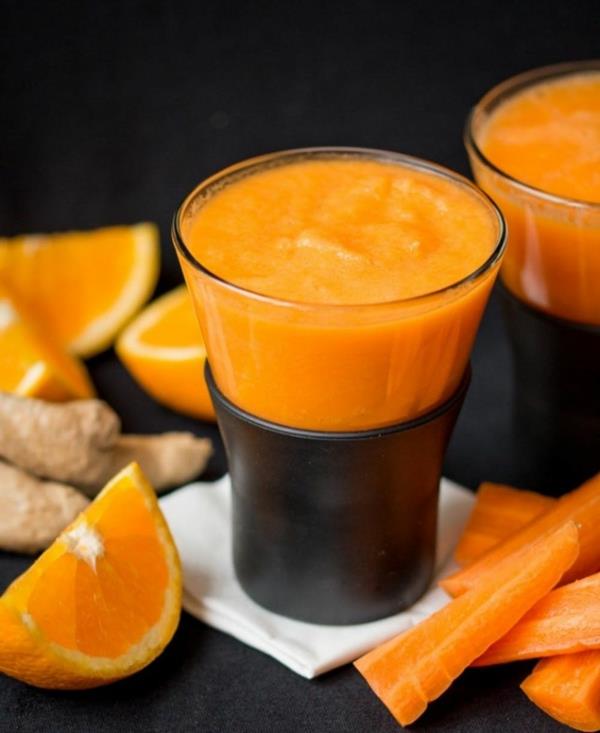 Ζεστά smoothies χειμώνα πίνει τζίντζερ καρότα πορτοκάλια