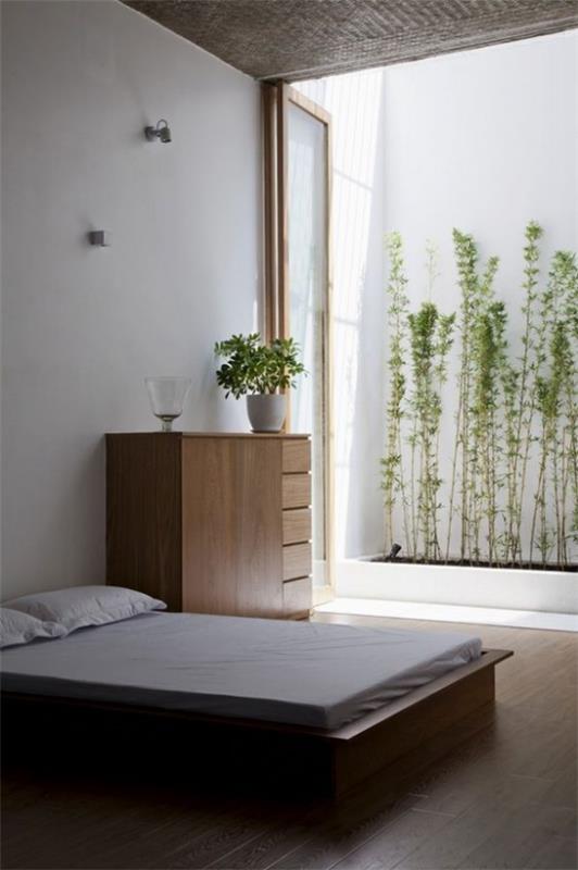 Το υπνοδωμάτιο Zen φέρνει μια φρέσκια πράσινη πινελιά στο εσωτερικό πράσινο φυτό