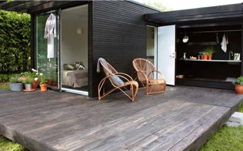 ελκυστικά σχέδια ξύλινων σπιτιών προκατασκευασμένα ξύλινα πάνελ μαύρα
