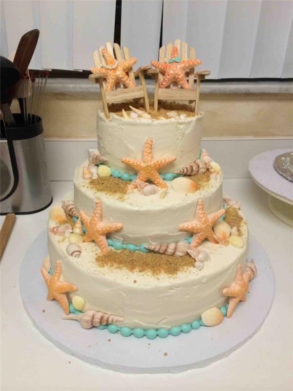 φανταχτερά κέικ για γάμο αντανακλούν την παραλία