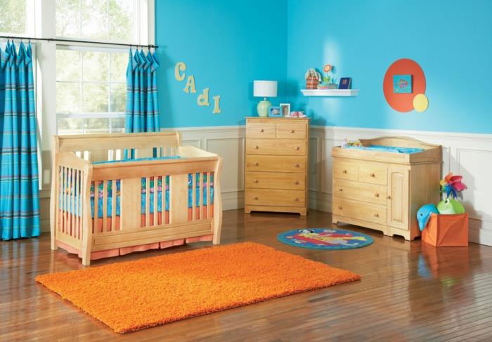 βρεφική κούνια σχέδιο παιδικού δωματίου πορτοκαλί χαλί μπλε τοίχο χρώμα