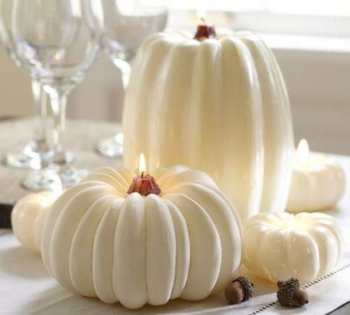 δημοφιλείς διακοσμήσεις αποκριών λευκές κολοκύθες με κεριά