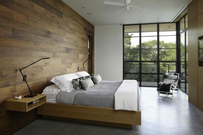κρεβάτι χωρίς κεφαλάρι μοντέρνος χώρος ύπνου ξύλινη επένδυση τοίχου