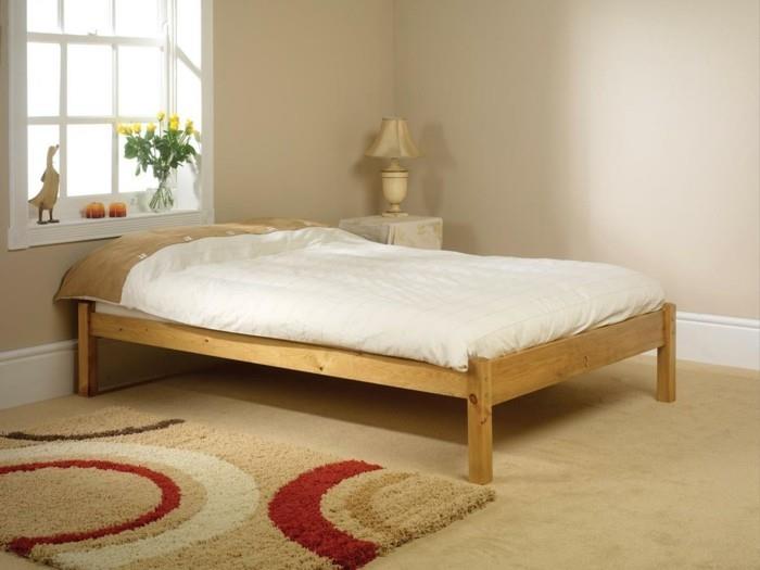 κρεβάτι χωρίς κεφαλάρι απλό κρεβάτι ξύλο όμορφο γεωμετρικό χαλί