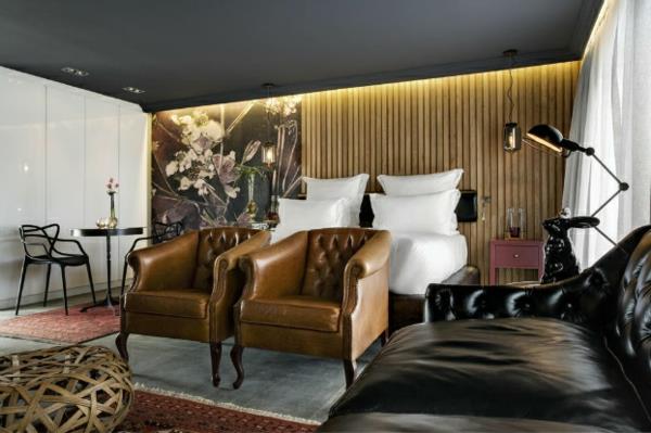 καφέ δερμάτινη πολυθρόνα καναπές δωματίου ξενοδοχείου μαύρο ελκυστικό υπερβολικό