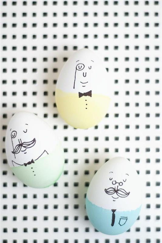 ζωηρόχρωμα πασχαλινά αυγά που ζωγραφίζουν αντιμετωπίζουν πασχαλινά αυγά με παιδιά