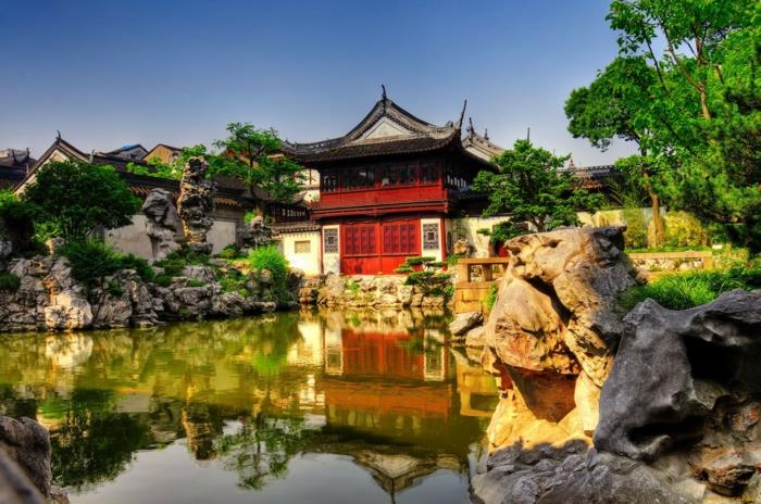 κινεζική λίμνη κήπου φυσικές πέτρες πέτρινο κήπο περίπτερο