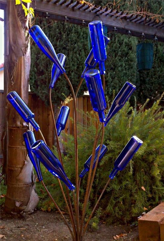 DIY ιδέες για τον σύγχρονο κήπο κάνουν όμορφα γλυπτά κήπου από μπουκάλια