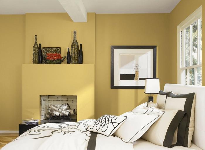 ιδέες διακόσμησης κρεβατοκάμαρα κίτρινο τοίχο βαφή τζάκι