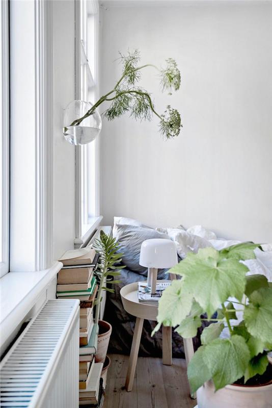 ιδέες επίπλωσης κρεβατοκάμαρα φυτά βιβλία ξύλινο πάτωμα