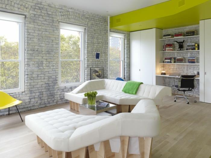 Επιπλώστε διαμέρισμα ενός δωματίου σοφίτα διαμέρισμα από τούβλα σε λευκό φόντο