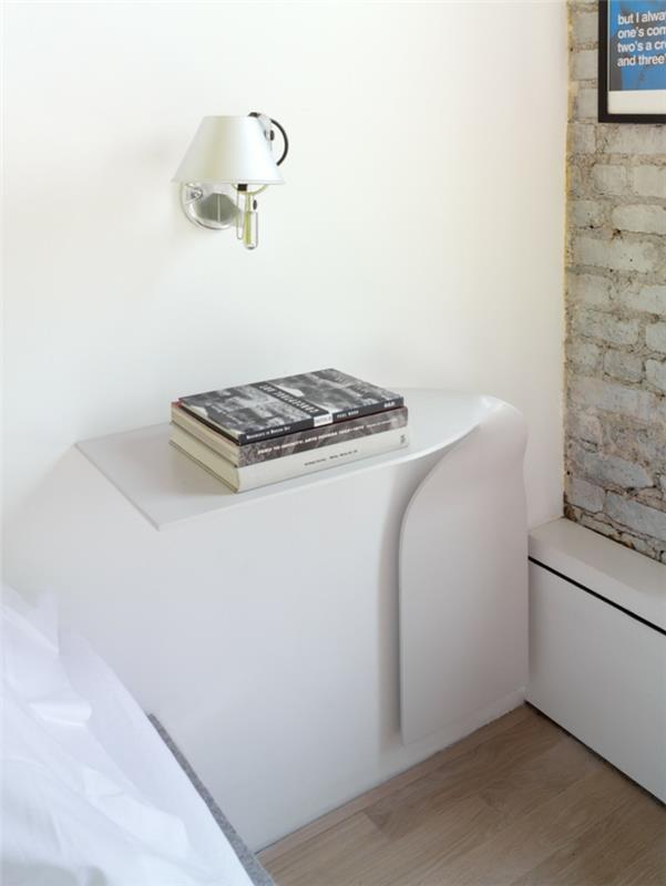 διαμέρισμα ενός δωματίου με φωτιστικό τοίχου κομοδίνο μοντέρνου σχεδιασμού τοίχο από τούβλα